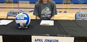 Blue Knights Volleyball Signs April Jonason from Rogers HS